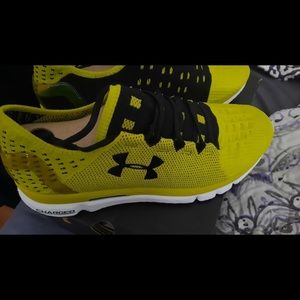 Brand new yellow under armor shoes.